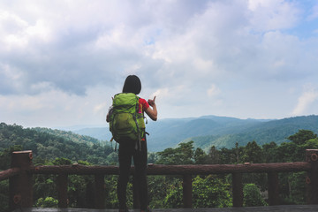 hiker women standing on mountain