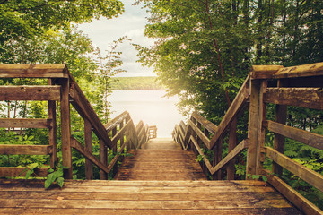 Beautiful landscape day view at Canadian Ontario Kettles lake in Midland with wooden staircase to...