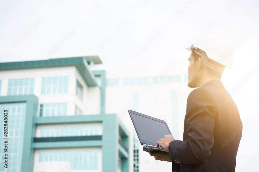 Aufkleber engineer holding computer and working technology