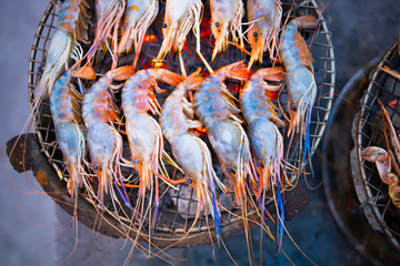 Grilled shrimp on a charcoal stove