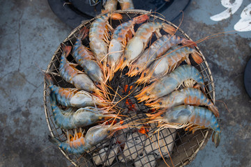 Grilled shrimp on a charcoal stove