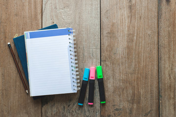 blank notebook on desk background.