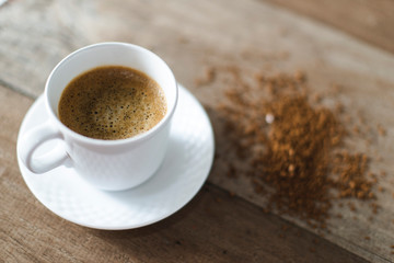 Obraz premium coffee cup served on table with coffee grinder