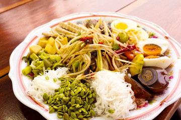 Papaya salad with Thai spicy food