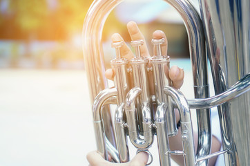 Young student Musician playing the Euphonium with Music practice of Band, Musical concept © mansong