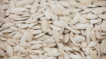 Pumpkin seeds. background. the texture of the pumpkin seeds