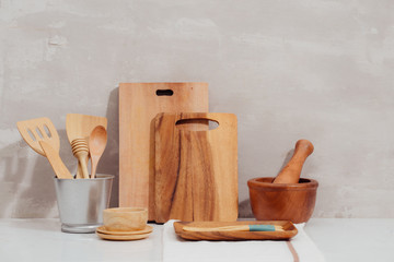 Kitchen utensils background with a blank space for a text, home kitchen decor concept, front view