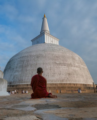 Buddhist Monk Meditating at a Stupa, Anuradhapura, Sri Lanka