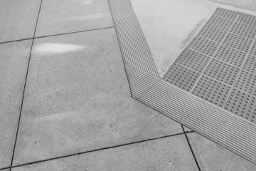 Details of concrete slab sidewalk or walkway accessible for use by wheelchair bound individual....