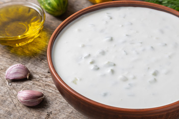 Tzatziki sauce made of yogurt, cucumbers, garlic and olive oil. National Greek cuisine. 