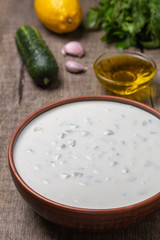 Tzatziki sauce made of yogurt, cucumbers, garlic and olive oil. National Greek cuisine. 