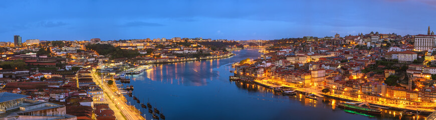 Fototapeta na wymiar Porto Portugal night panorama city skyline at Porto Ribeira and Douro River
