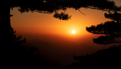 UNESCO World Heritage Site Natural beautiful landscape silhouette sunset Huangshan mountain scenery ( Yellow mountain ) in Anhui CHINA, It is a best of China major tourist destination.