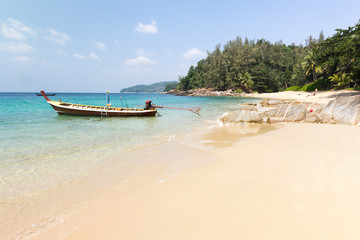 Fototapeta na wymiar Longtail boat anchored at Banana beach, Phuket, Thailand