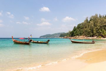 Longtail boats anchored at Banana beach, Phuket, Thailand