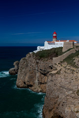 Fototapeta na wymiar The Lighthouse at Cape St. Vincent or Cabo de Sao Vicente, the southwesternmost point of mainland Europe in Portugal.
