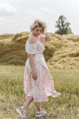 Fototapeta na wymiar Plus size model in cotton dress. Fashion concept, clothes for l- xl size