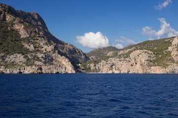 Naklejka na ściany i meble Karpathos island - The coast near Pigadia, in the distance Ahata beach, Dodecanese Islands, Greece