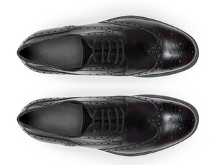 Classic male leather shoes isolated on a white, top view.