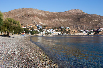 Tilos island - Livadi village, the long pebble beach on a sunny morning,  Aegean sea, Dodecanese Islands, Greece