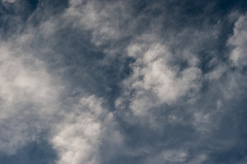 Fototapeta na wymiar white clouds on a background of blue sky on a sunny day.