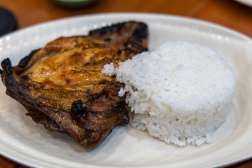 grilled chicken with rice and salad