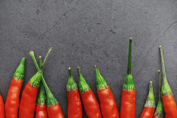 Hot red pepper. Chilean pepper on a black.