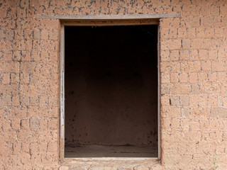 Clay wall with door for background