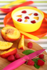 Fruit and Yogurt. The Healthy Eating. Peach, Raspberries.
