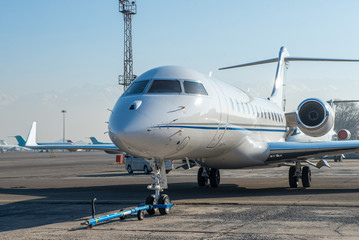 Business jet plane on the ground.