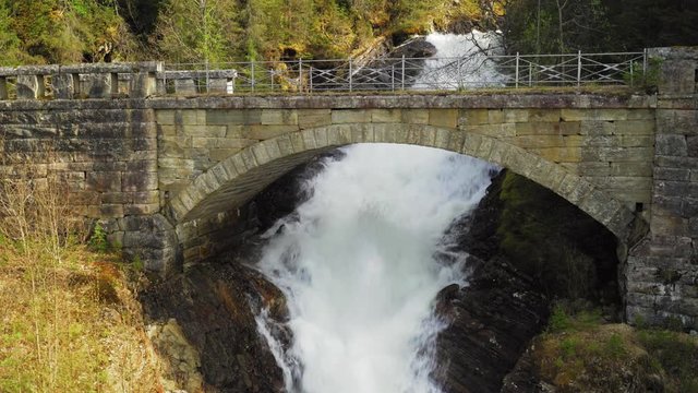 A waterfall under the Urdlanga old bridge near Moi Rana, Norway.