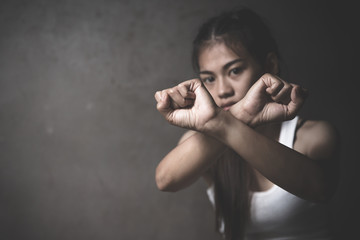 woman raised her hand for dissuade, campaign stop violence against woman. stop violence against Women, international women's day