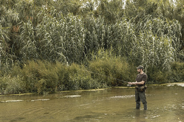Man fishing at the river