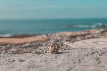 Rock and the beach