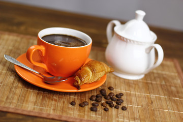 Coffee Cup and Croissant Cookie. Breakfast.