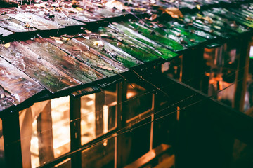 Old wooden roofs that are wet with rain, rain with wooden roofs, traditional house details