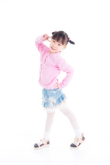 Little asian girl standing and smiles over white background