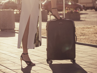 Fashion model traveling to new city