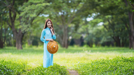 Asian woman wearing traditional Vietnam culture