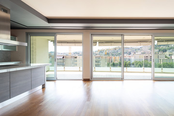 Living room with kitchen island, modern apartment