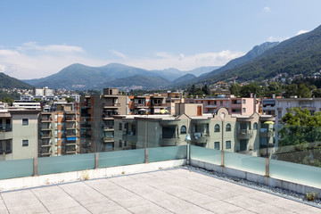 Private terrace with city and mountain views