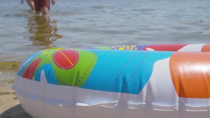 Summer scene. Tourists swim in the sea. Summer time 