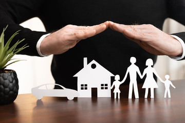 Concept of family, home and car insurance