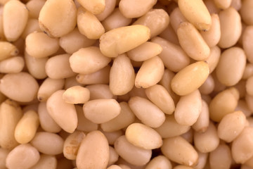 Pine nuts background texture, copy space, close up. Top view, flat lay