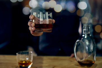 hand with glass of beer