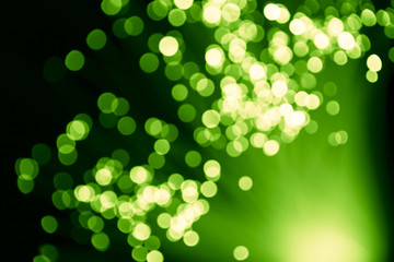 Obraz premium Defocused green lights optical fiber