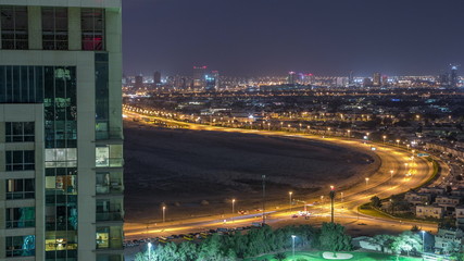 Obraz premium Aerial view to villas and houses with Golf course night timelapse