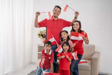happy asian family indonesia celebrating independence day at home together