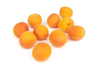 Apricots heap on white