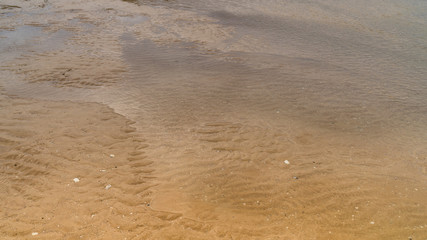 yellow sand by the sea